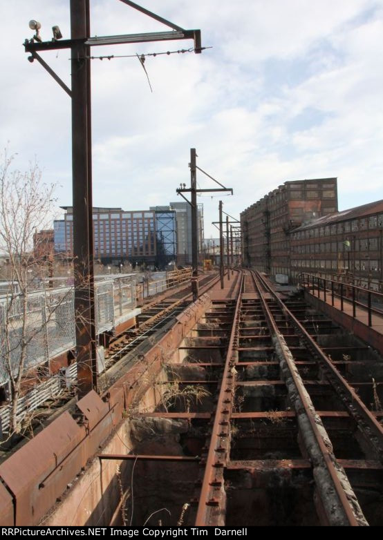 Looking at the dual gauge ROW. Note the overhead wire to power the railcars.